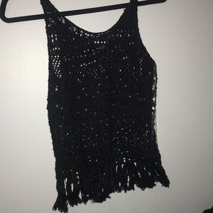A black crochet tank top